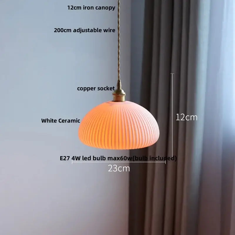 A warm white ceramic led pendant lamp with ribbed texture and brass accents from decorbites ceramic led collection