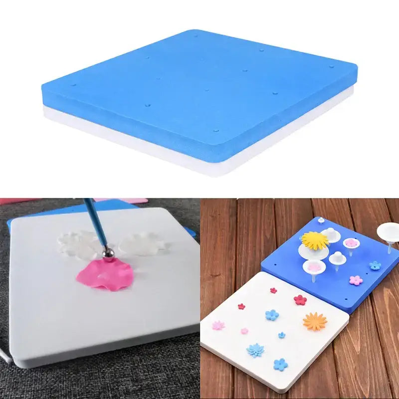 Blue and white silicone foam cake shaping mat with pre-drilled holes for precise cake shaping and floral designs
