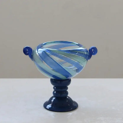 Blue striped transparent glass pedestal bowl with blue and light green swirl and rounded handles for living room decorbites decor
