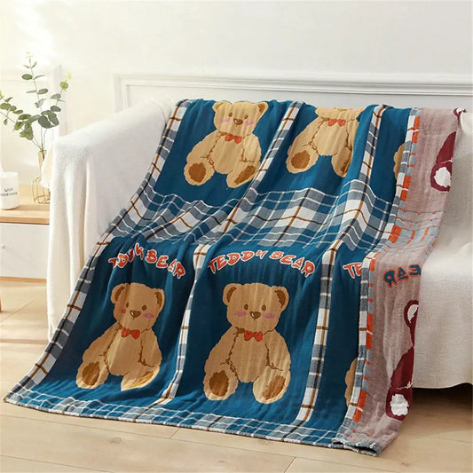 Blue teddy bear gauze cotton bath towel featuring embroidered tan teddy bears with red bows and plaid border patterns