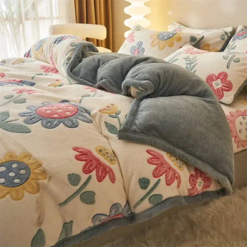 Cream-colored plush winter velvet duvet cover with embroidered floral patterns and soft gray textured border