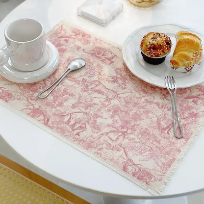 Pink and cream toile-patterned decorbites cotton linen meal mat with frayed edges for dining room table use