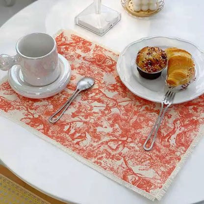 Blue toile decorbites cotton linen meal mat in vibrant orange and cream with frayed edges for dining table use