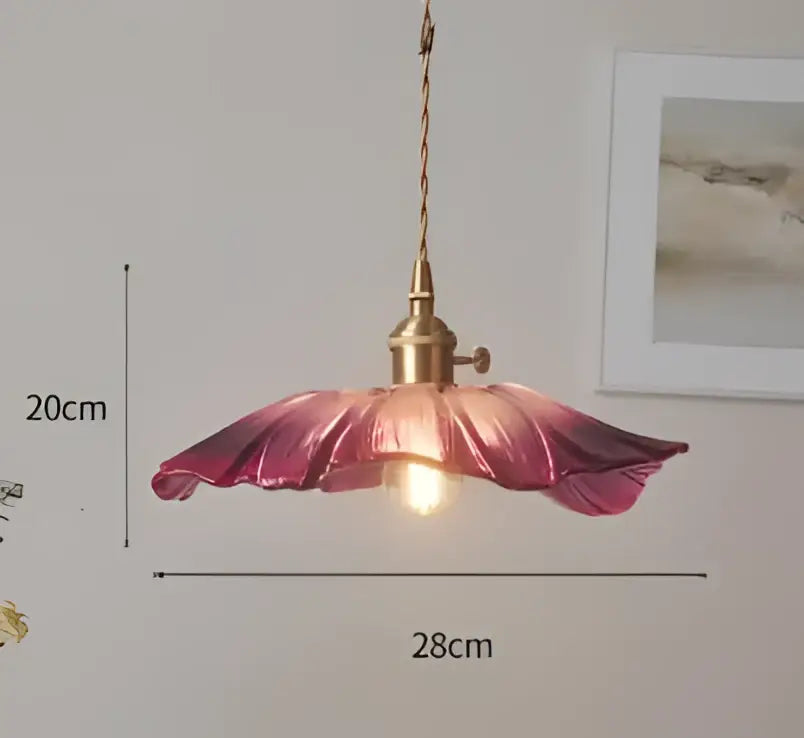 Delicate pink glass pendant light with brass fixture and twisted cord shaped like open flower by decorbites pendant lights