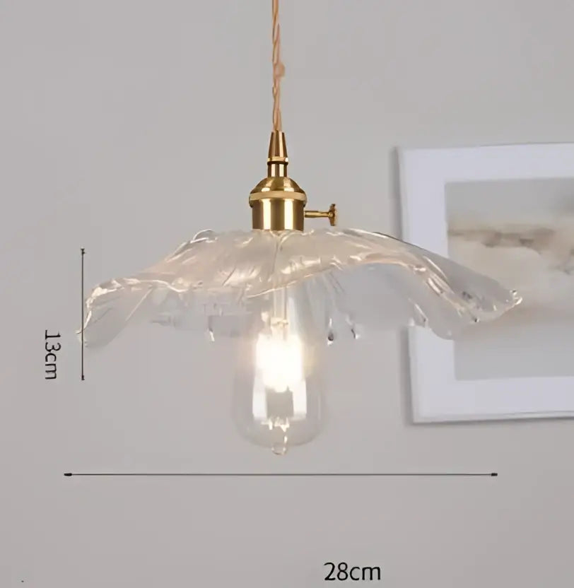 Blue translucent glass pendant light with brass fixture and exposed bulb ideal for bedroom decorbites pendant lights