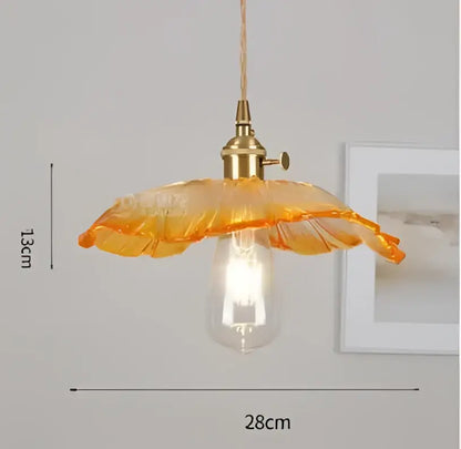 Orange glass pendant light with brass fixture and exposed bulb decorbites pendant lights for bedroom decor