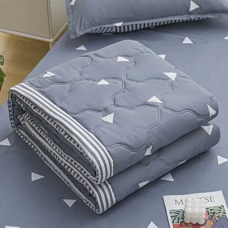 Blue whale best vacation daisy print quilt bedroom blanket with gray quilted fabric white triangular patterns and striped border decorbites daisy print