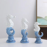 Three blue and white cartoon seahorse ceramic statues with intricate texture for living room decor by decorbites
