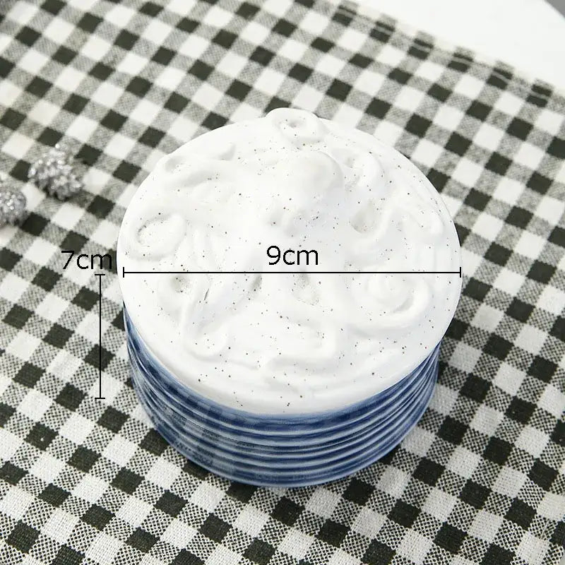 White ceramic coaster with blue rim and intricate embossed design for decorbites ceramic marine life bedroom decor