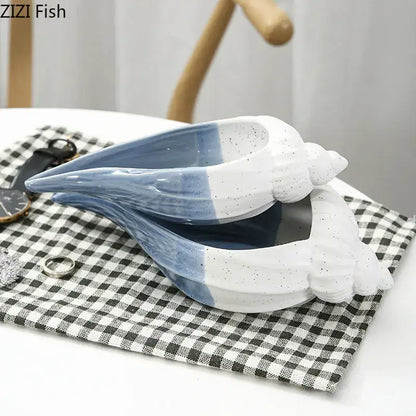 Blue and white ceramic marine life clamshell tray with speckled texture decorbites ceramic marine decor for bedroom