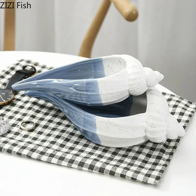 Blue and white ceramic marine life clamshell tray with speckled texture decorbites ceramic marine decor for bedroom