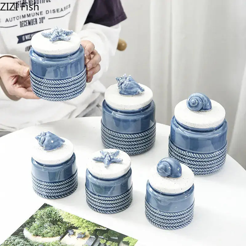 Set of five blue ceramic marine life storage jars with white lids featuring sea creature figurines for decorbites ceramic marine collection