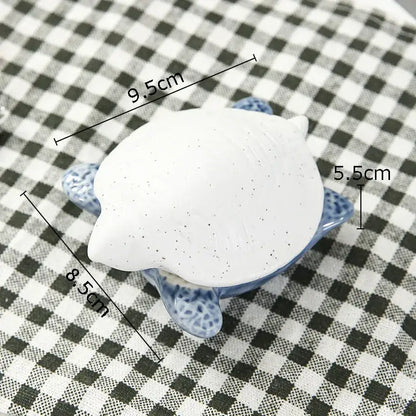 White ceramic turtle figurine with blue speckled shell and textured surface for decorbites ceramic marine life decorbites ceramic marine life