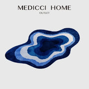 A blue and white cloud shaped tufted rug decorbites bath mat with a plush geode design and non slip textured surface