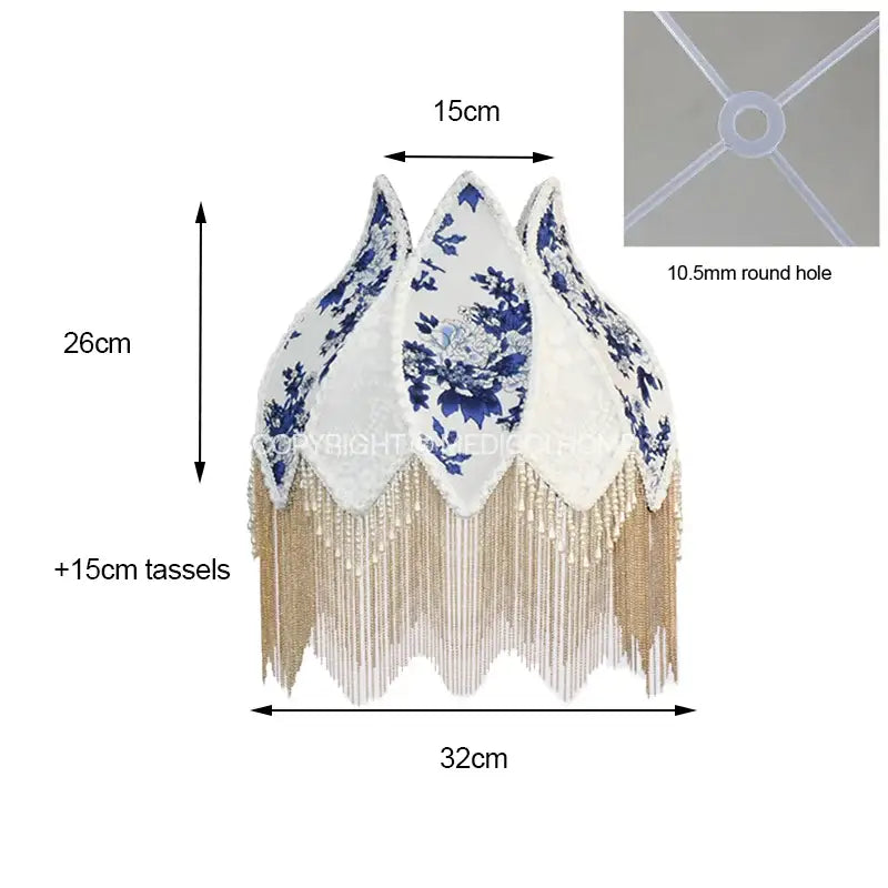 Elegant blue and white porcelain floral lampshade with pearl tassel bedroom decor featuring cascading gold details
