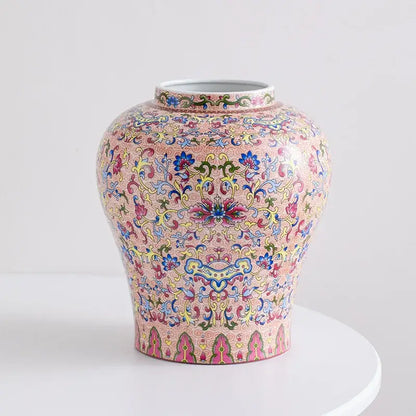 A pink porcelain vase with intricate blue white porcelain floral and scrollwork patterns for living room decorbites decor