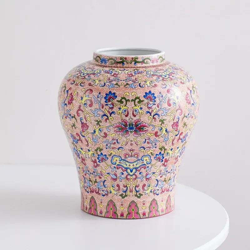 A pink porcelain vase with intricate blue white porcelain floral and scrollwork patterns for living room decorbites decor