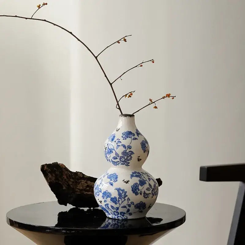 Blue and white porcelain gourd teapot vase with delicate floral patterns for living room decor