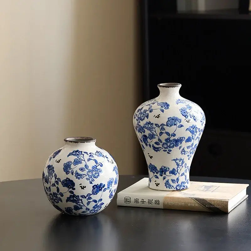Two white porcelain gourd vases with blue floral patterns including a porcelain gourd teapot vase for living room decor