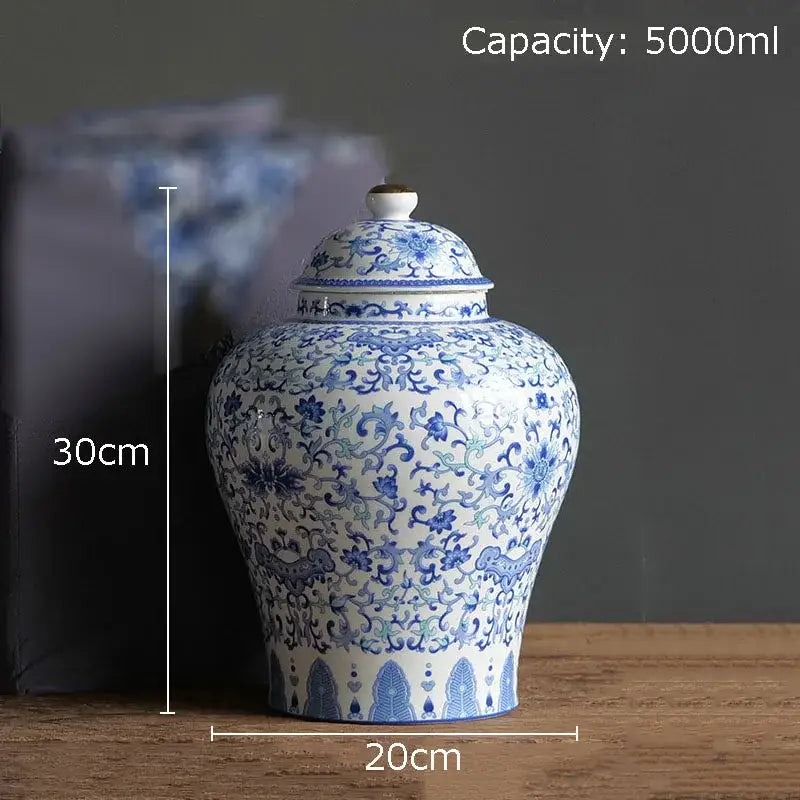 Blue and white porcelain jar with gold plating featuring intricate floral patterns for living room decor