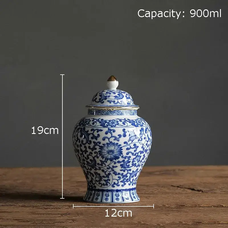 Blue and white porcelain jar with intricate floral patterns and gold plating for elegant living room decor