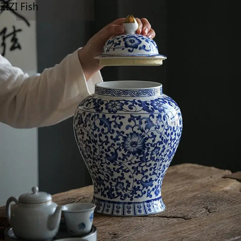 Classic blue and white porcelain jar with gold plating and floral patterns for elegant living room decor