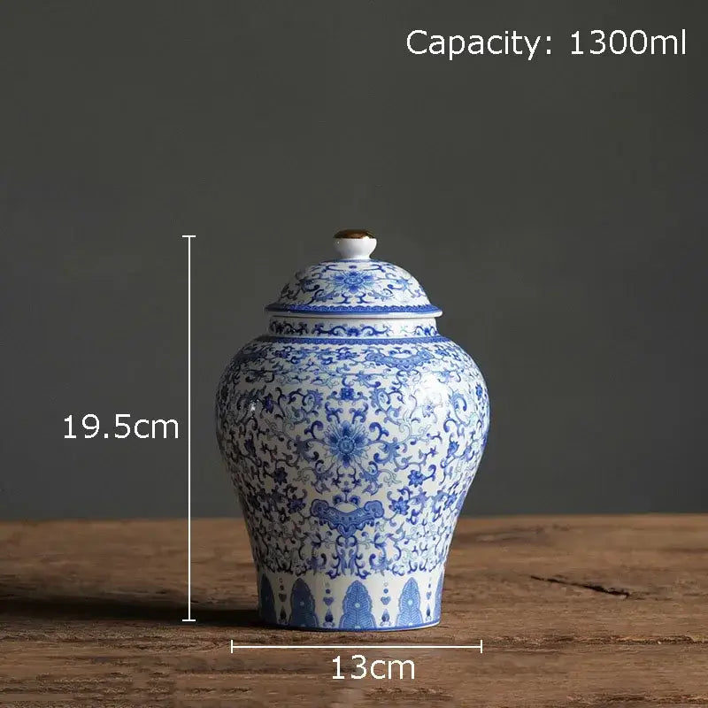 Blue and white porcelain jar with intricate floral patterns and gold plating for elegant living room decor