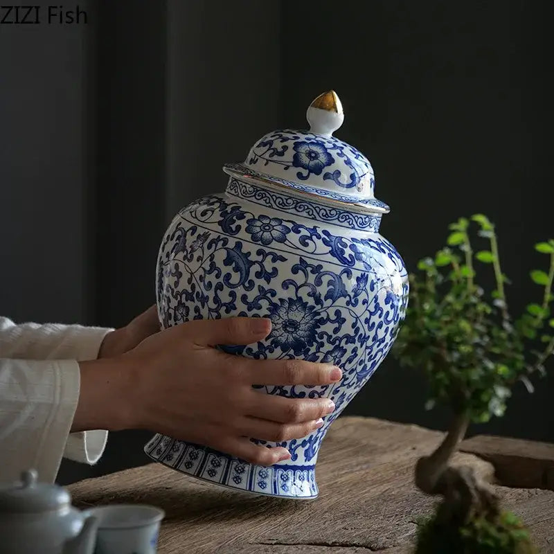 Blue and white porcelain jar with intricate floral patterns and gold plating for living room decor