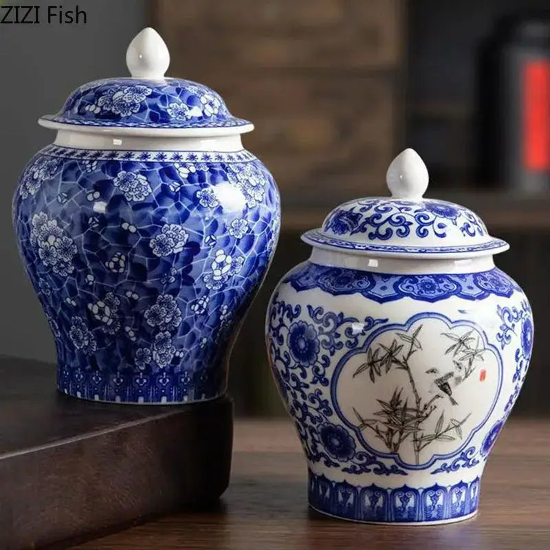 Blue and white porcelain tea canister with intricate floral and bamboo designs and matching white porcelain lids for kitchen storage