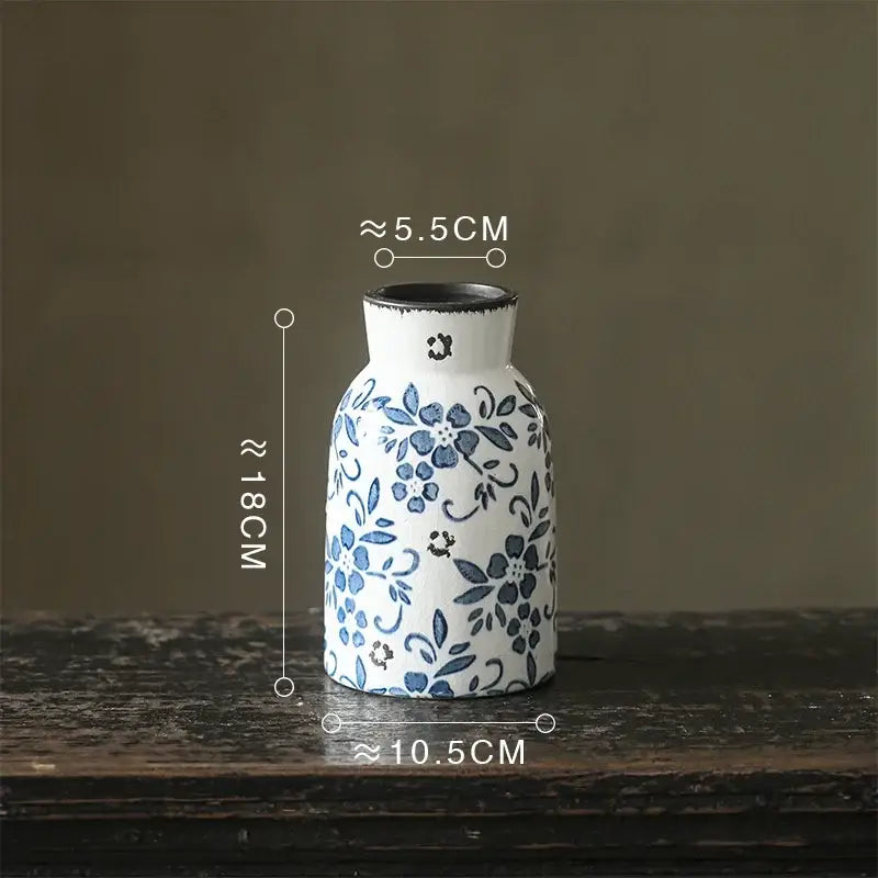 A white porcelain vase with blue floral patterns and black rim, 18 cm tall for hydroponic living room decorbites blue white porcelain