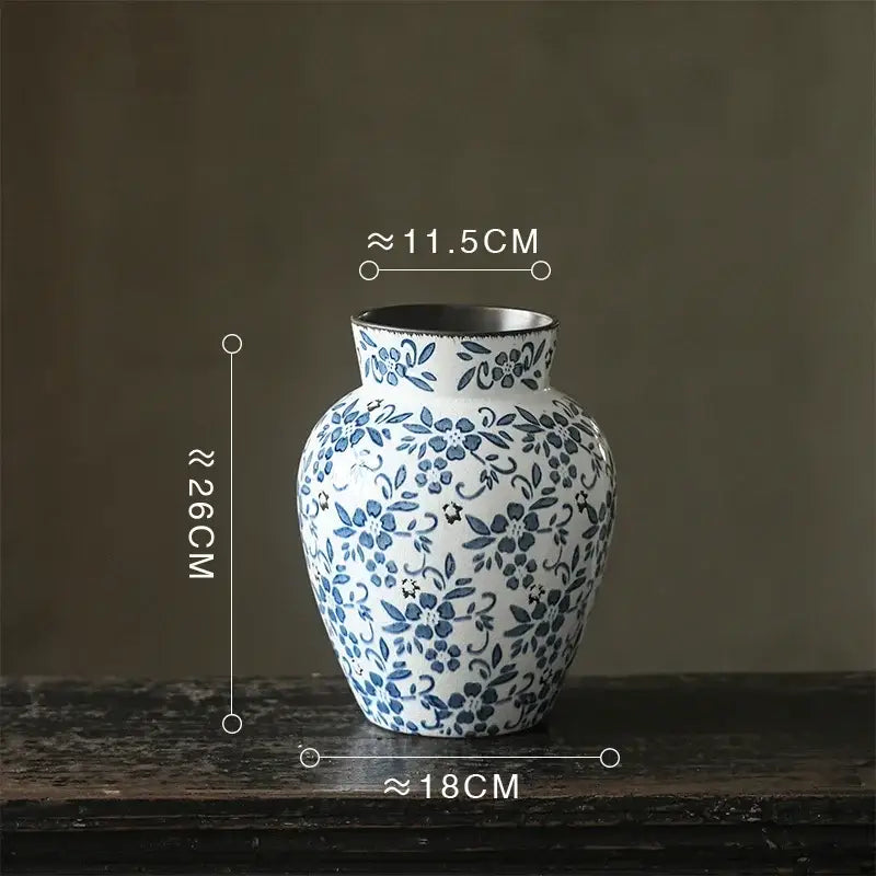 White porcelain vase with intricate blue floral patterns and metallic rim 26 cm tall for decorbites blue white collection