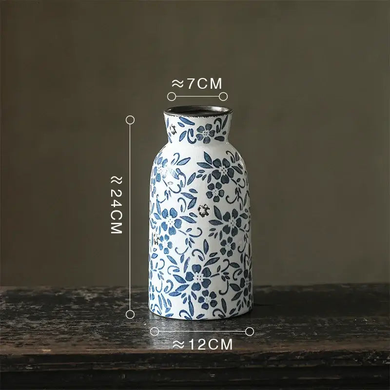White porcelain vase with intricate blue floral patterns and flared neck decorbites blue white porcelain hydroponic pot