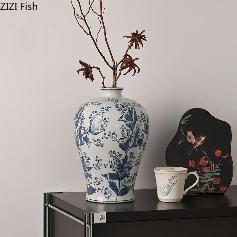A white porcelain vase with blue white porcelain floral and bird patterns for decorbites blue white living room decor