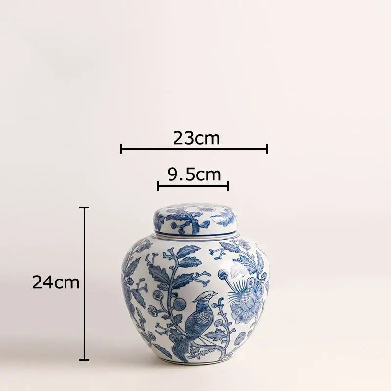 Blue white porcelain vase with intricate floral and bird motifs and matching lid for living room decorbites decor