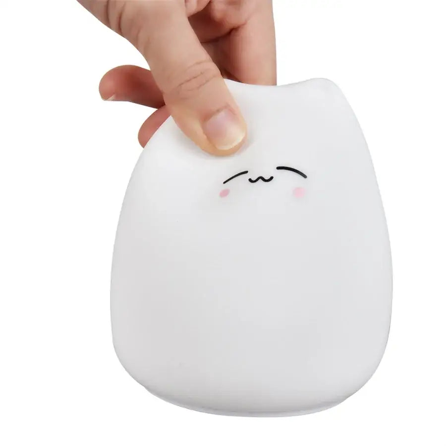White soft silicone cat-shaped stress reliever with smiling face and blush cheeks for decorbites cat silicone night light