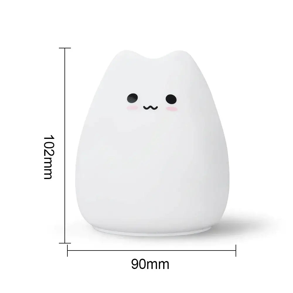 A soft white cat silicone touch night light with black eyes and a smiling face for bedroom decorbites cat silicone lamp