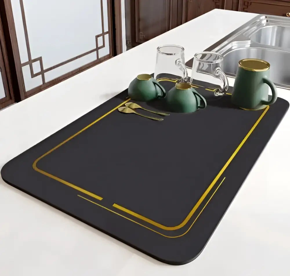 Black rectangular dish drying mat with gold trim and decorative lines for dining table mat decorbites dining table use