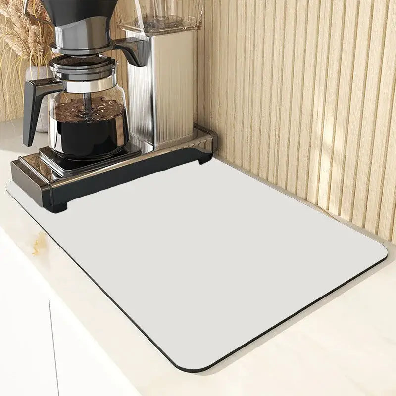 A sleek gray dining table mat with a black border from decorbites perfect for kitchen and dining table decor