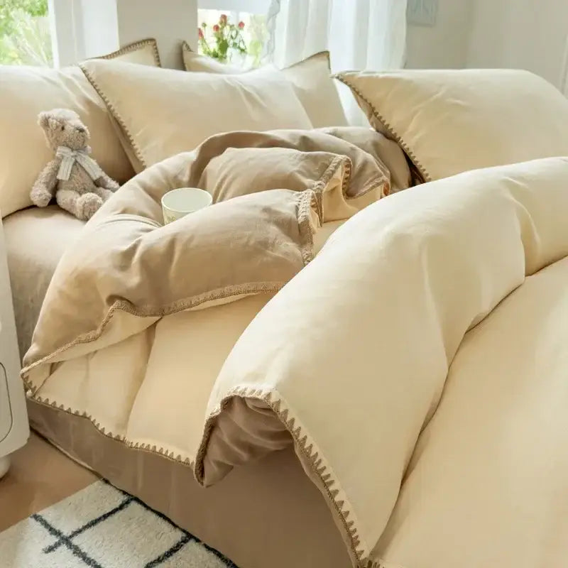 Cream-colored quilted cotton bedding set with soft fabric and subtle beige stitching for a cozy bedroom look