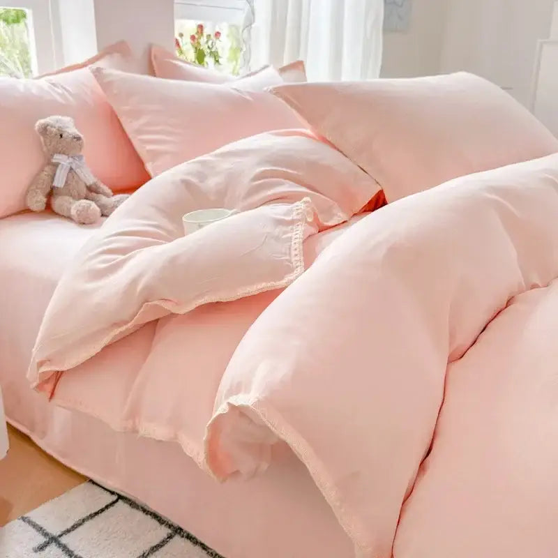 Soft blush pink and gray cotton bedding set with cozy plush texture and zigzag stitch cover including pillowcases