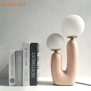 Blush pink ceramic table lamp with two frosted white glass ball led shades for bedroom decorbites glass ball lighting