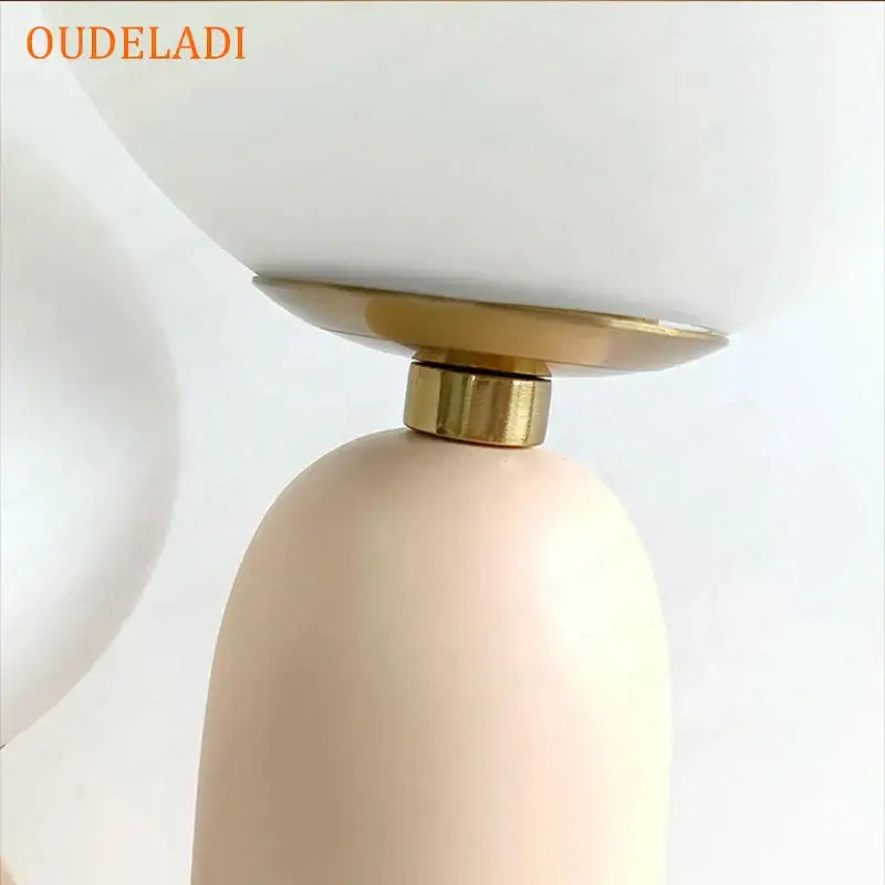 Blush pink and white glass ball led table lamp by oudeladi with matte glass globe shade and ceramic base for bedroom decorbites glass ball