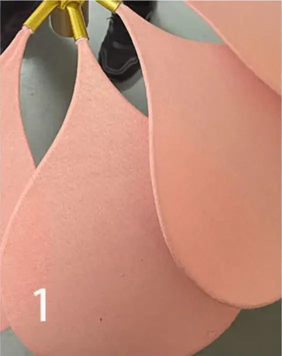 Pink teardrop-shaped foam makeup sponges with gold handles complement decorbites bohemia linen e27 pendant light decor