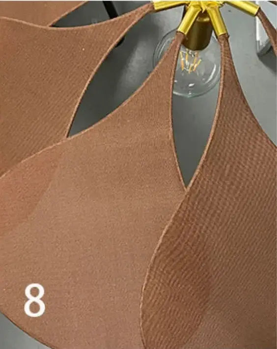 Tan leather leaf-shaped pendant light with gold-toned metal fixture from decorbites bohemia linen e27 cream flower series