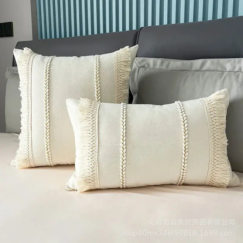 Cream-colored rectangular cushion cover with textured braided stripes and fringed edges for decorbites bohemia tassel decor