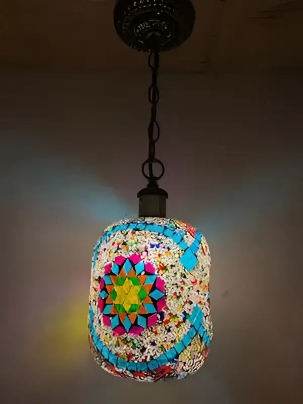 A vibrant oval-shaped bohemia turkish mosaic hanging sconce with colorful geometric tilework for bedroom vintage led light