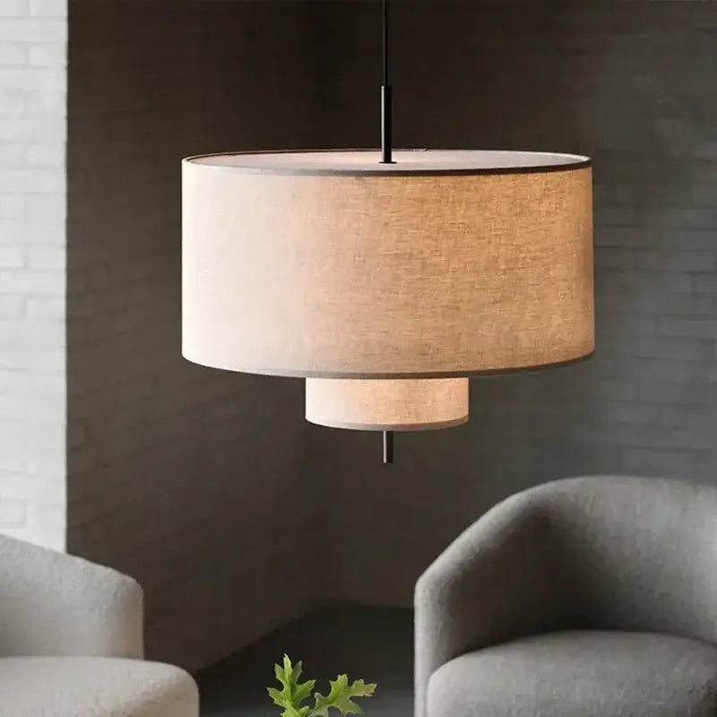 Beige linen drum pendant light with black metal rod from decorbites bohemia wabi sabi tiered pendant lights for dining room
