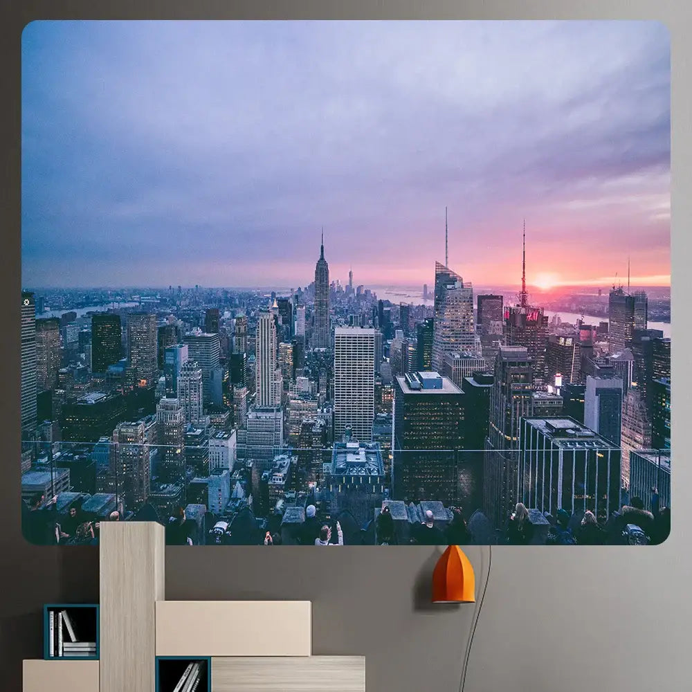 A decorbites bohemian art tapestry featuring a vibrant purple and pink new york cityscape sunset for living room decor