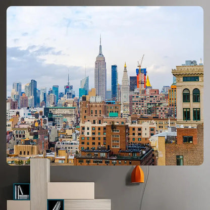 A vibrant orange pendant lamp complements decorbites bohemian art tapestry featuring empire state cityscape design