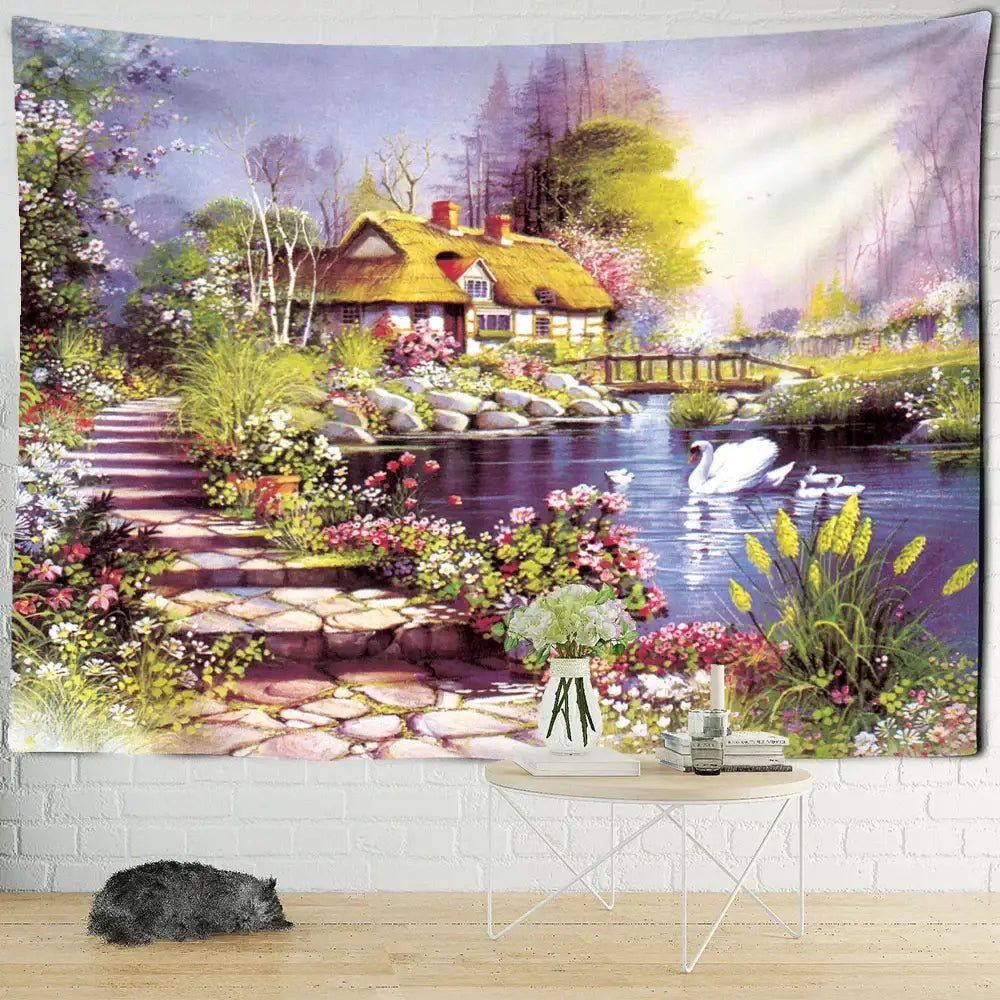 A vibrant decorbites forest tapestry wall hanging depicting a thatched cottage by a pond with swans and flowers